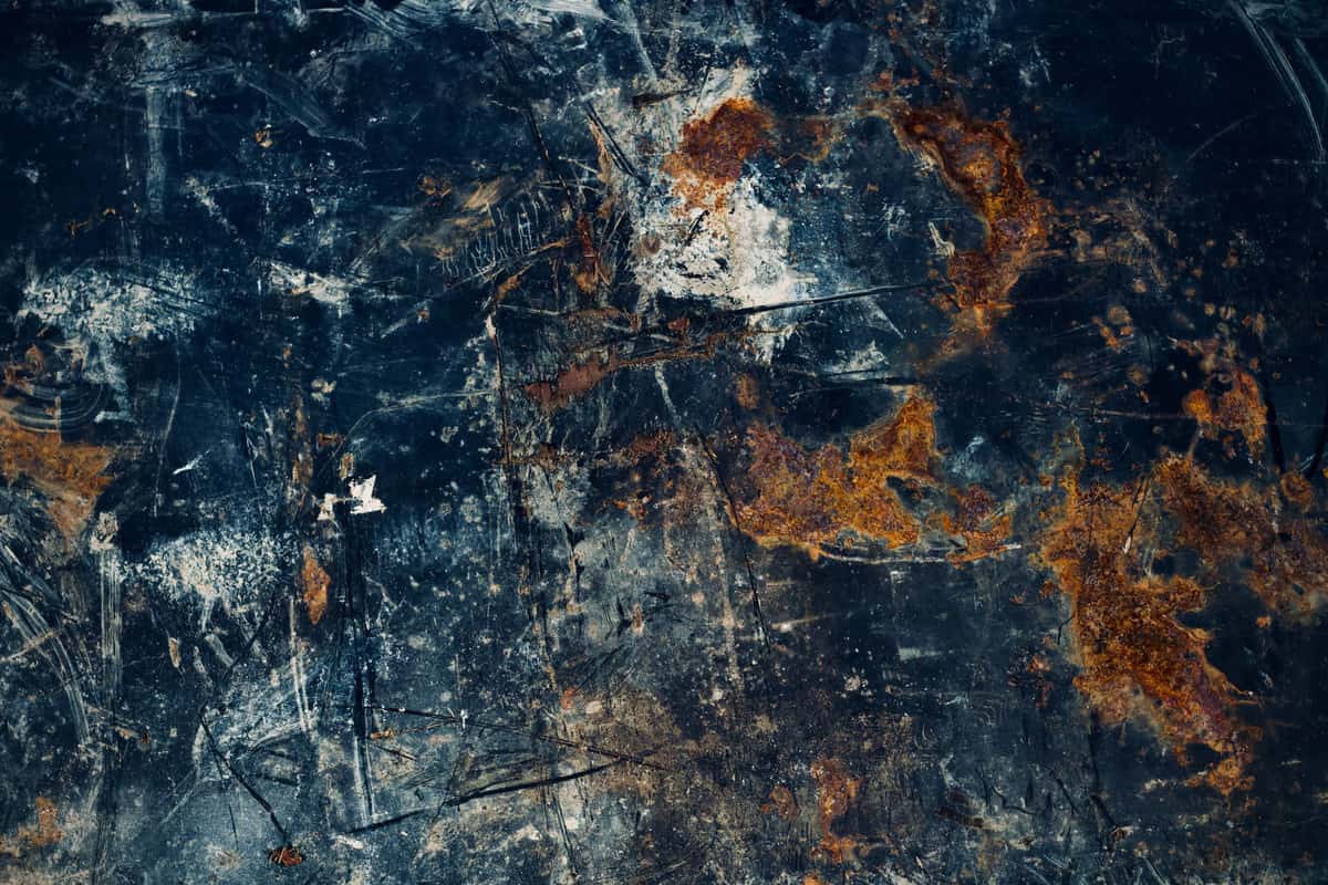 Close view of fine scratches across a brushed metal surface