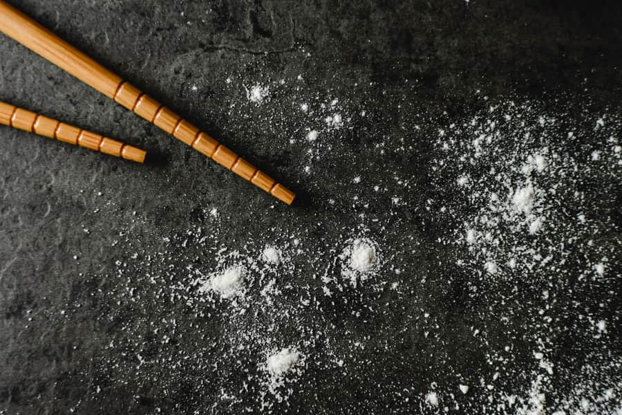 Cleaning tablets and powder on a kitchen counter